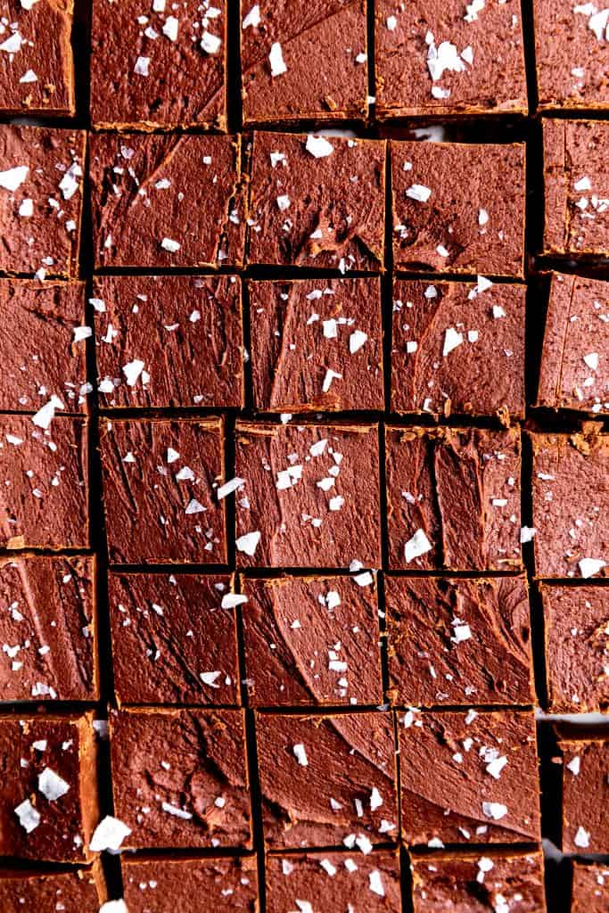 Close up of pieces of vegan fudge pressed tightly together.