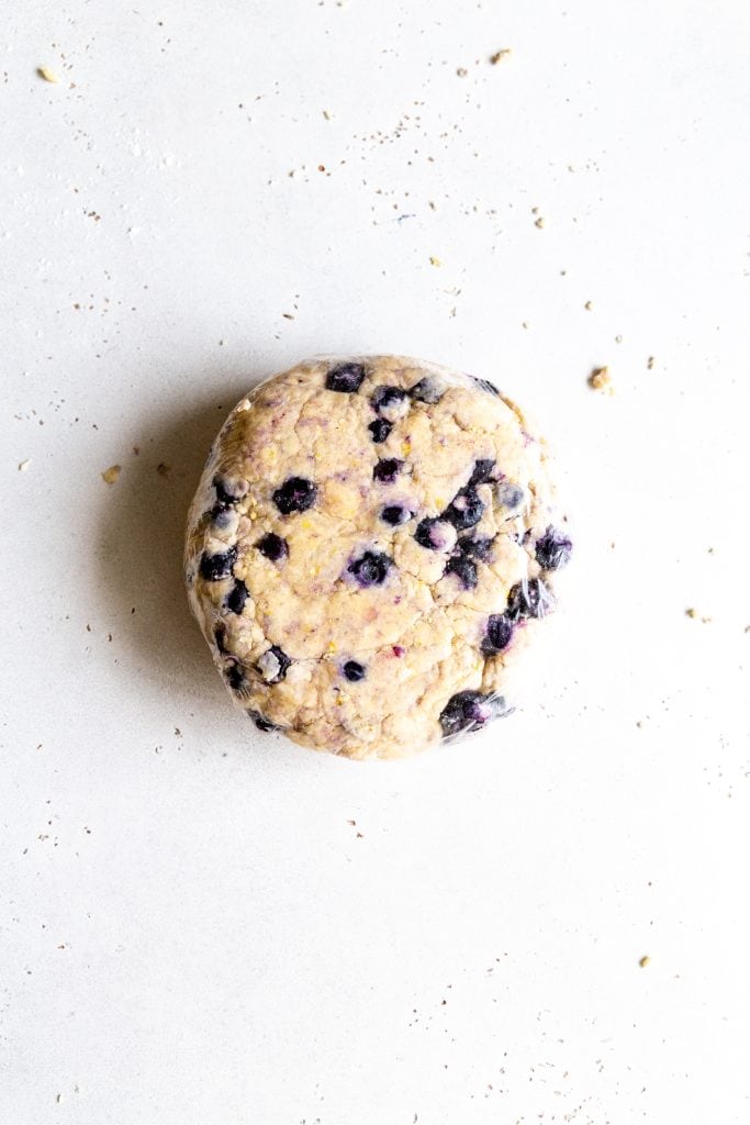 Disk of lemon blueberry scone dough.