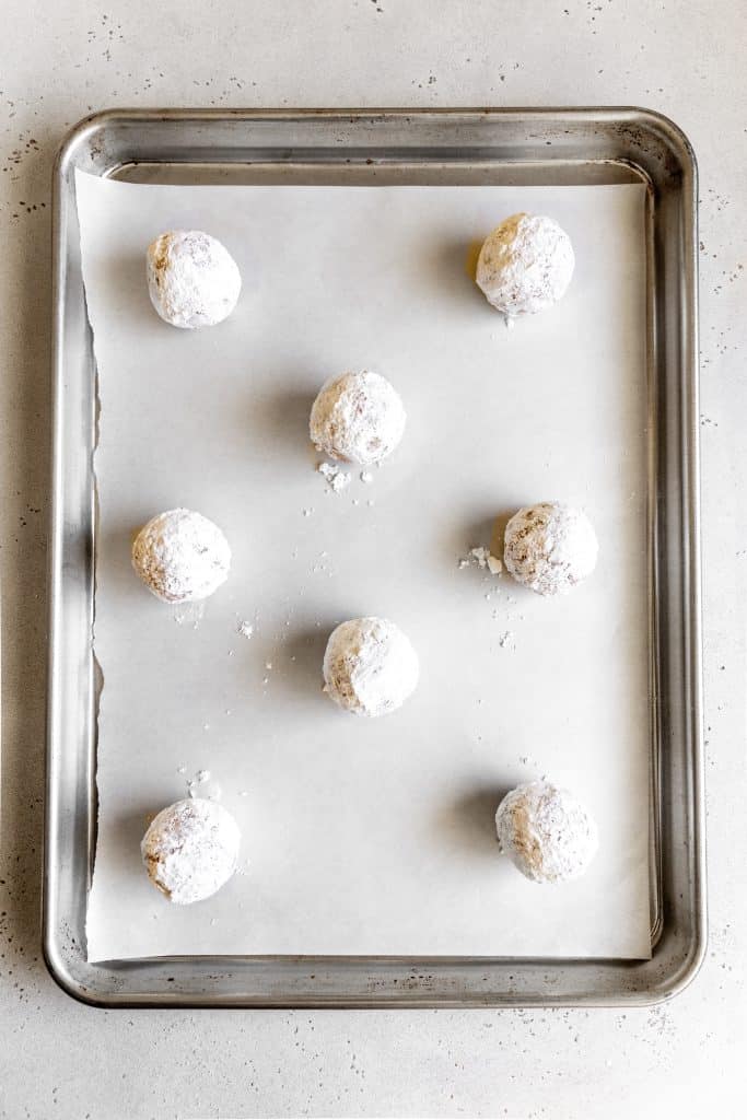 Unbaked vegan strawberry crinkle cookies.