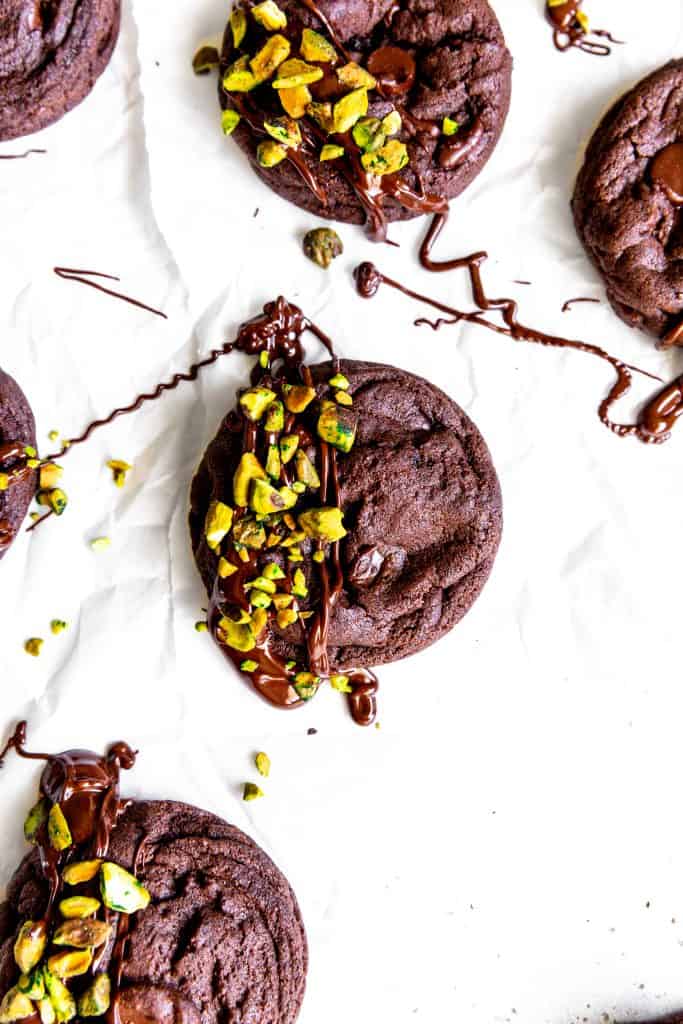 Double chocolate cookie drizzled in melted chocolate and topped with chopped pistachios.