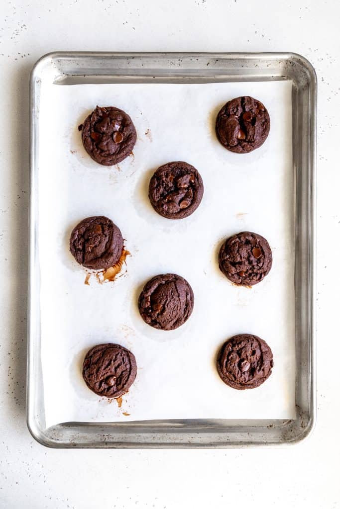 Chocolate cookies on a baking sheet.