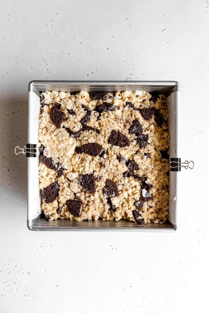 Unset oreo rice krispie treats pressed into a baking pan.