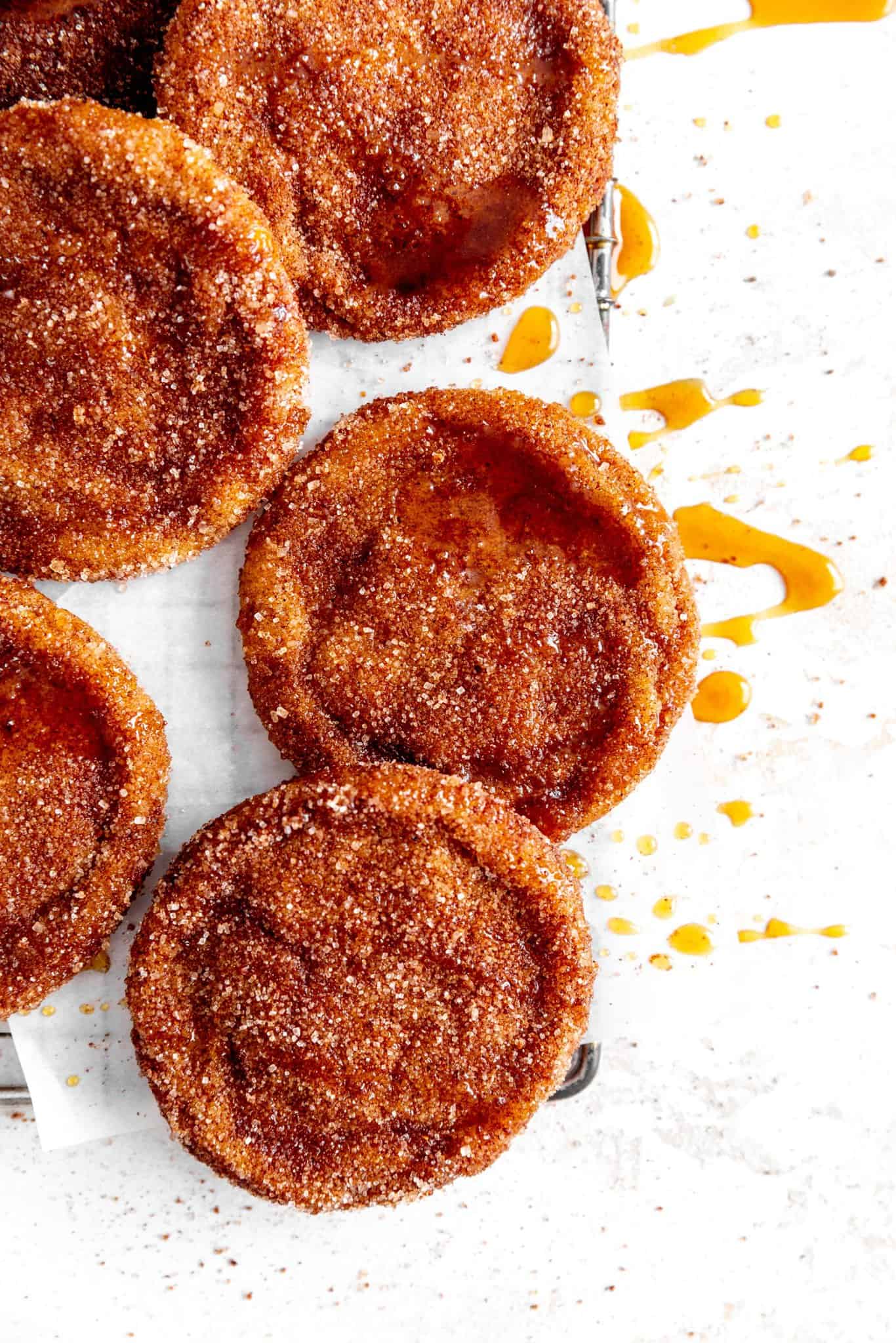 Apple cider cookies on a wire rack.