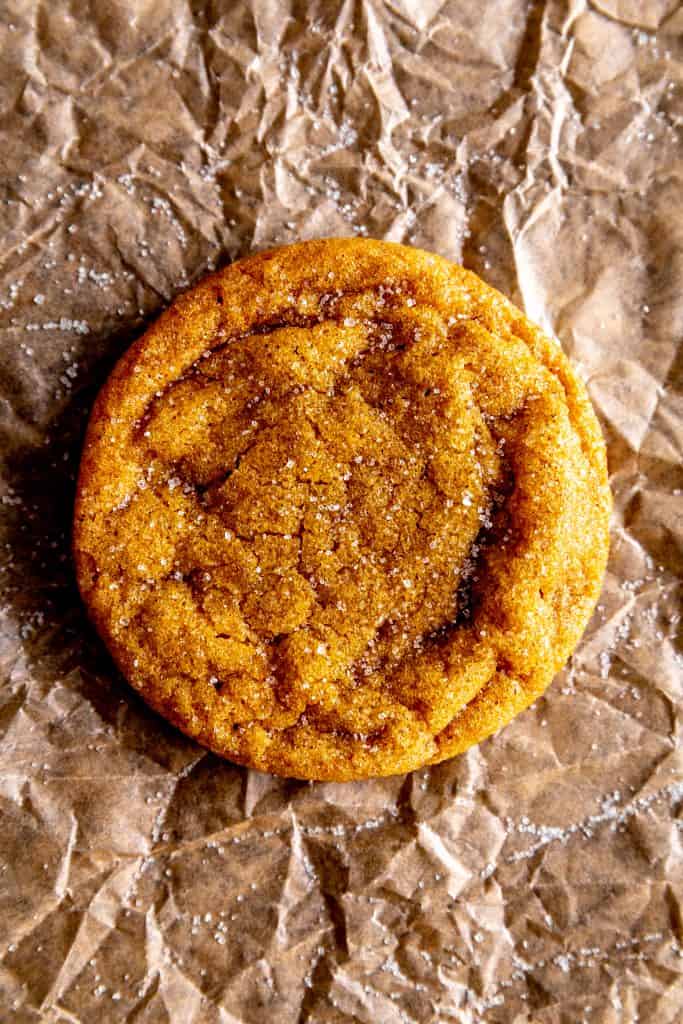 Vegan sugar cookie on brown parchment paper.