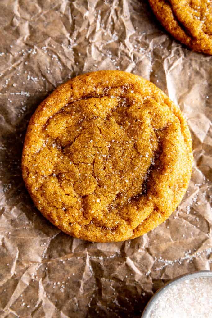 Vegan sugar cookie on brown parchment paper.