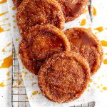 Vegan apple cider cookies on a wire cooling rack.