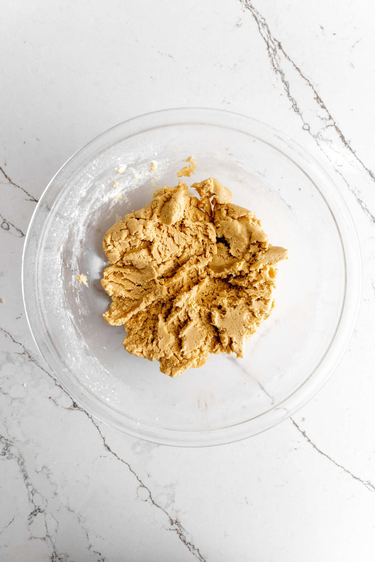 Vegan cookie dough in a glass bowl.