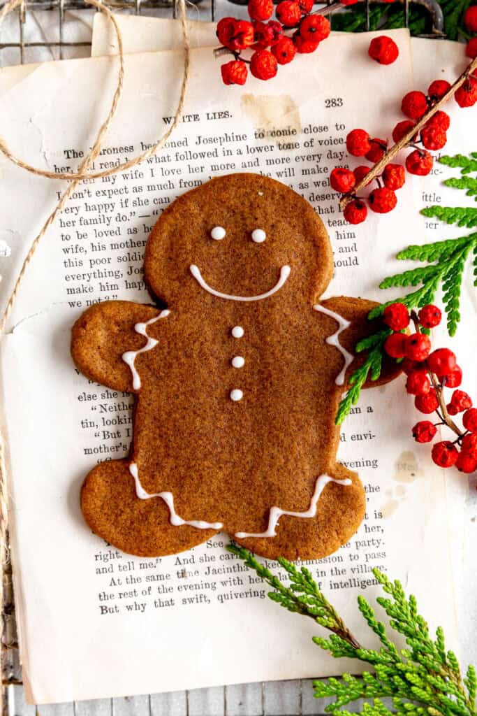 Gingerbread man cookie on a wire cooling rack.