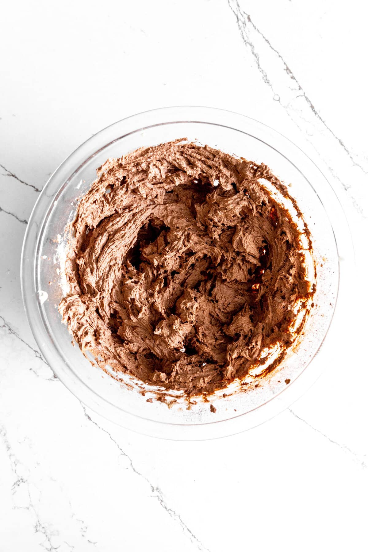 Glass bowl of chocolate cookie dough.