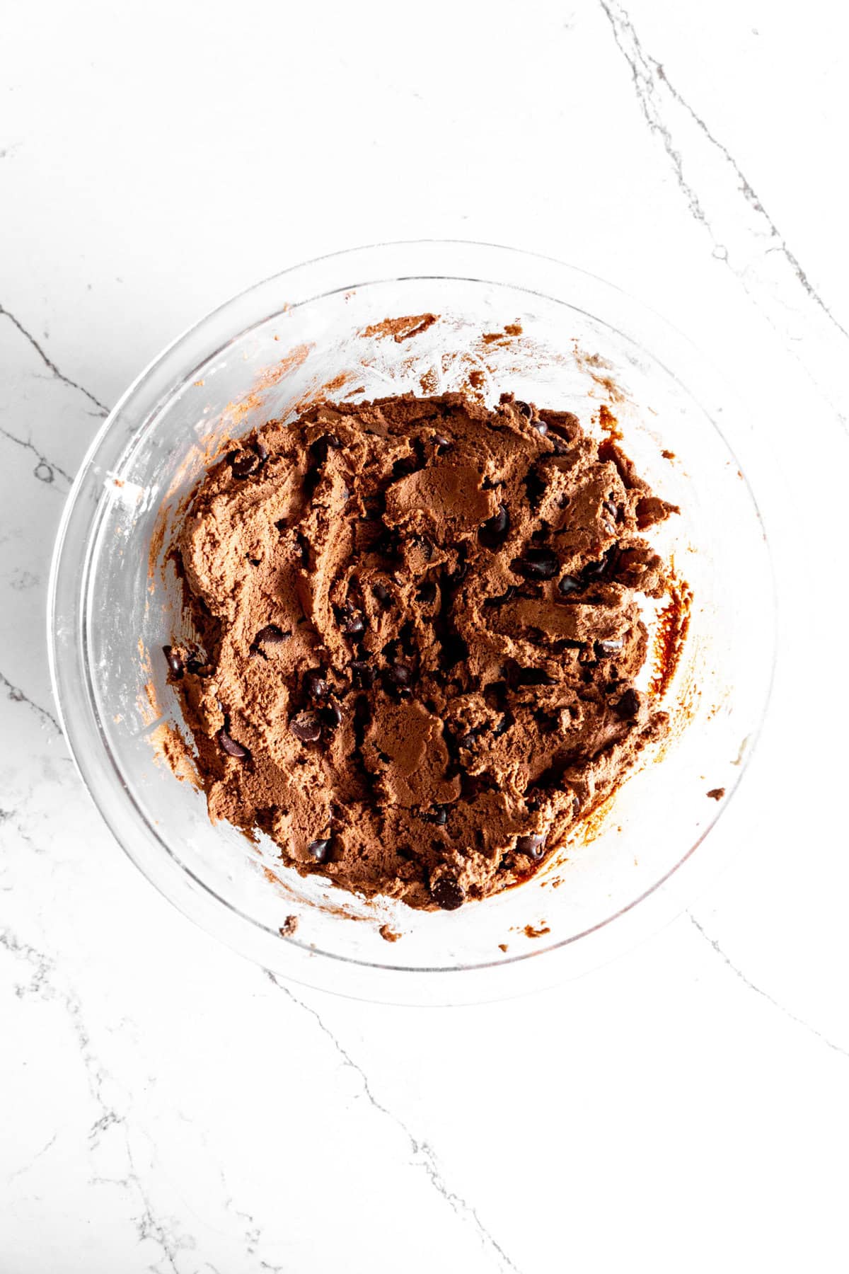 Glass bowl of double chocolate cookie dough.