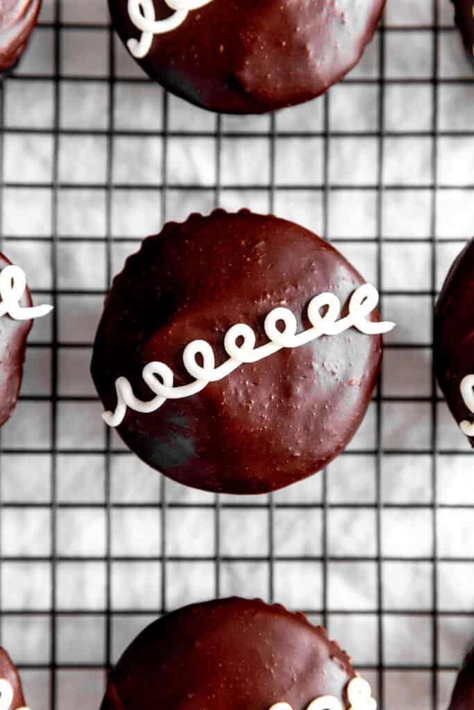 Hostess cupcake on a wire cooling rack.