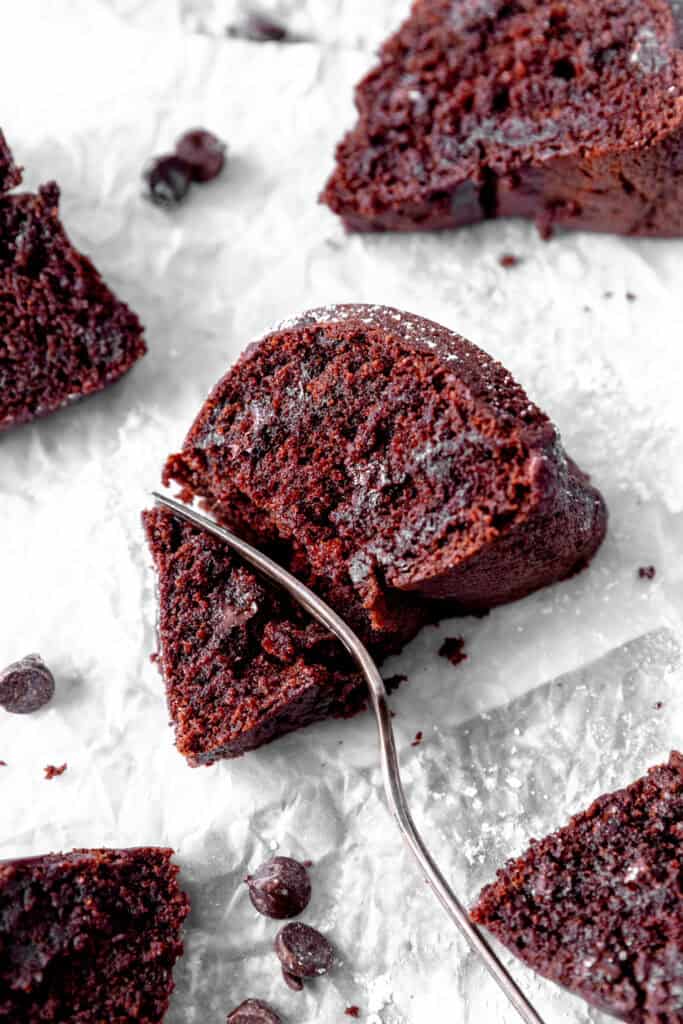 Fork cutting into a slice of Kahlúa cake.