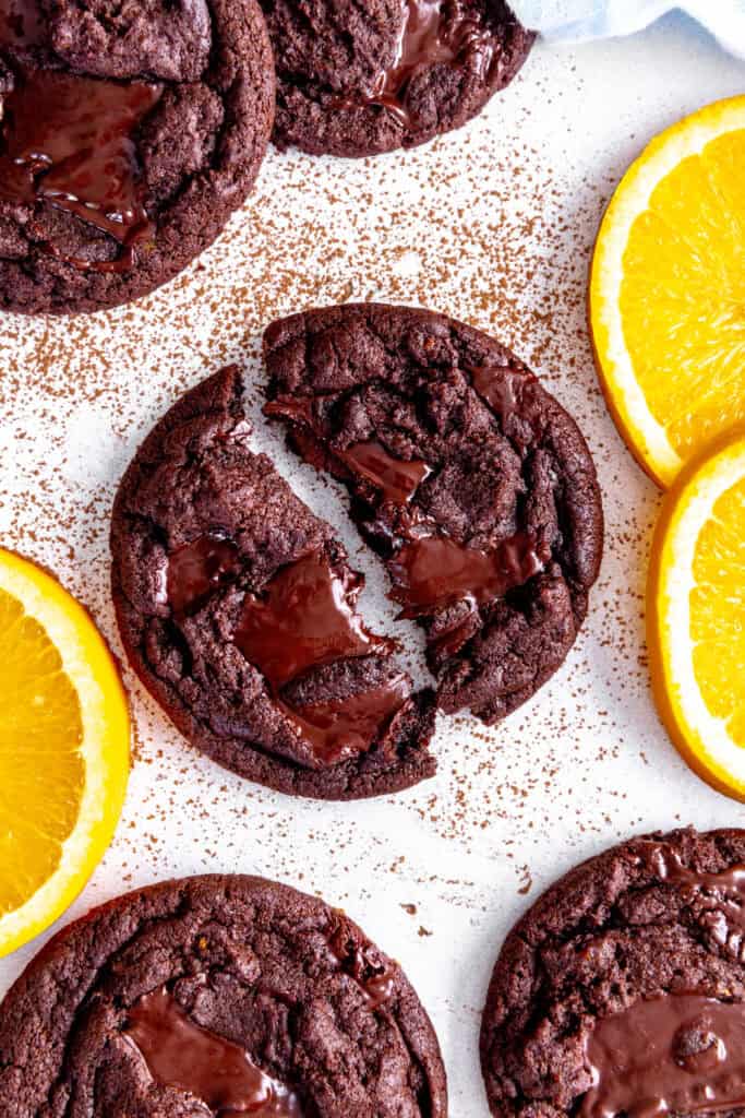 Orange chocolate cookie broken in half.