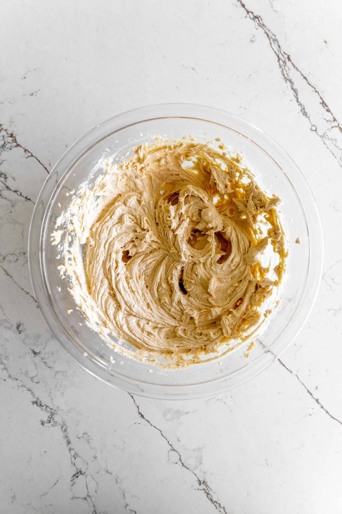 Cookie dough in a glass bowl.