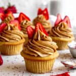 Strawberry tiramisu cupcakes and spilled strawberry jam.