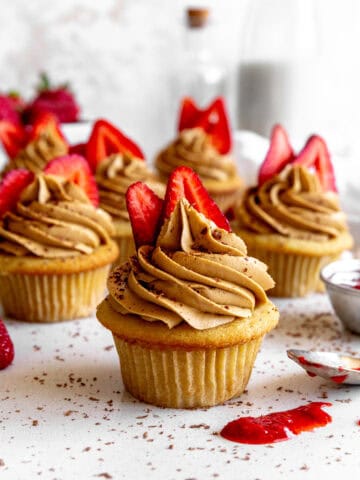 Strawberry tiramisu cupcakes and spilled strawberry jam.
