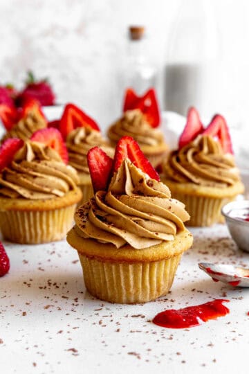 Strawberry tiramisu cupcakes and spilled strawberry jam.