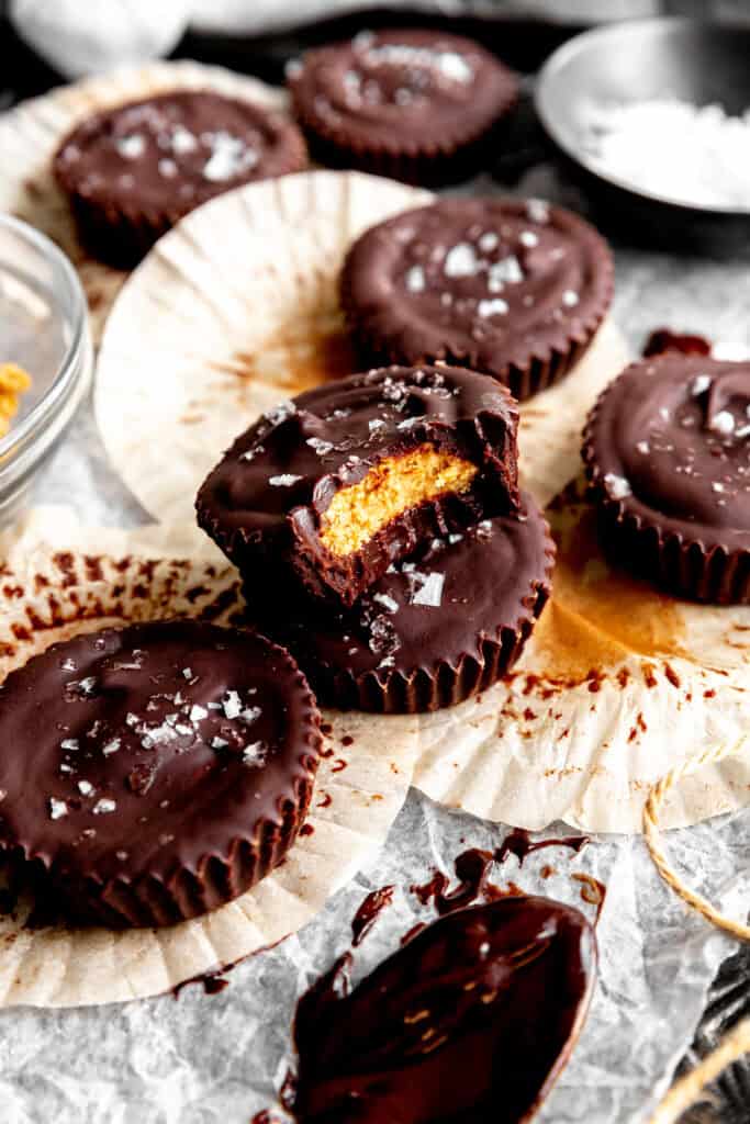 Stack of peanut butter cups on a baking sheet.
