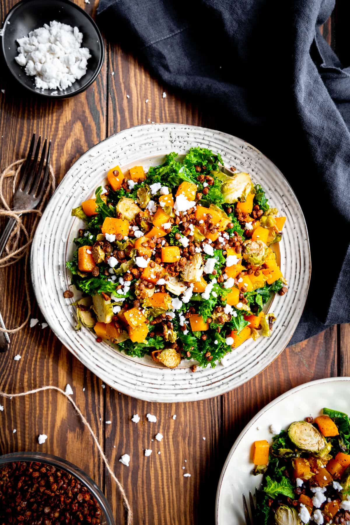 Kale butternut squash salad and a linen napkin.
