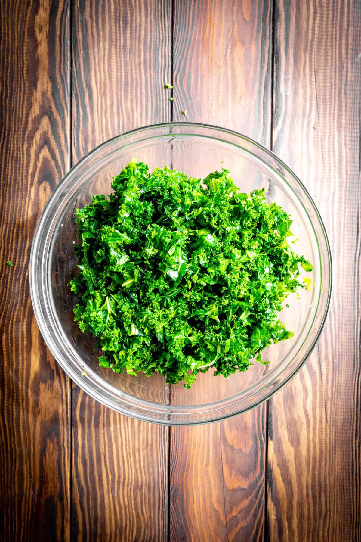 Kale leaves in a glass bowl.