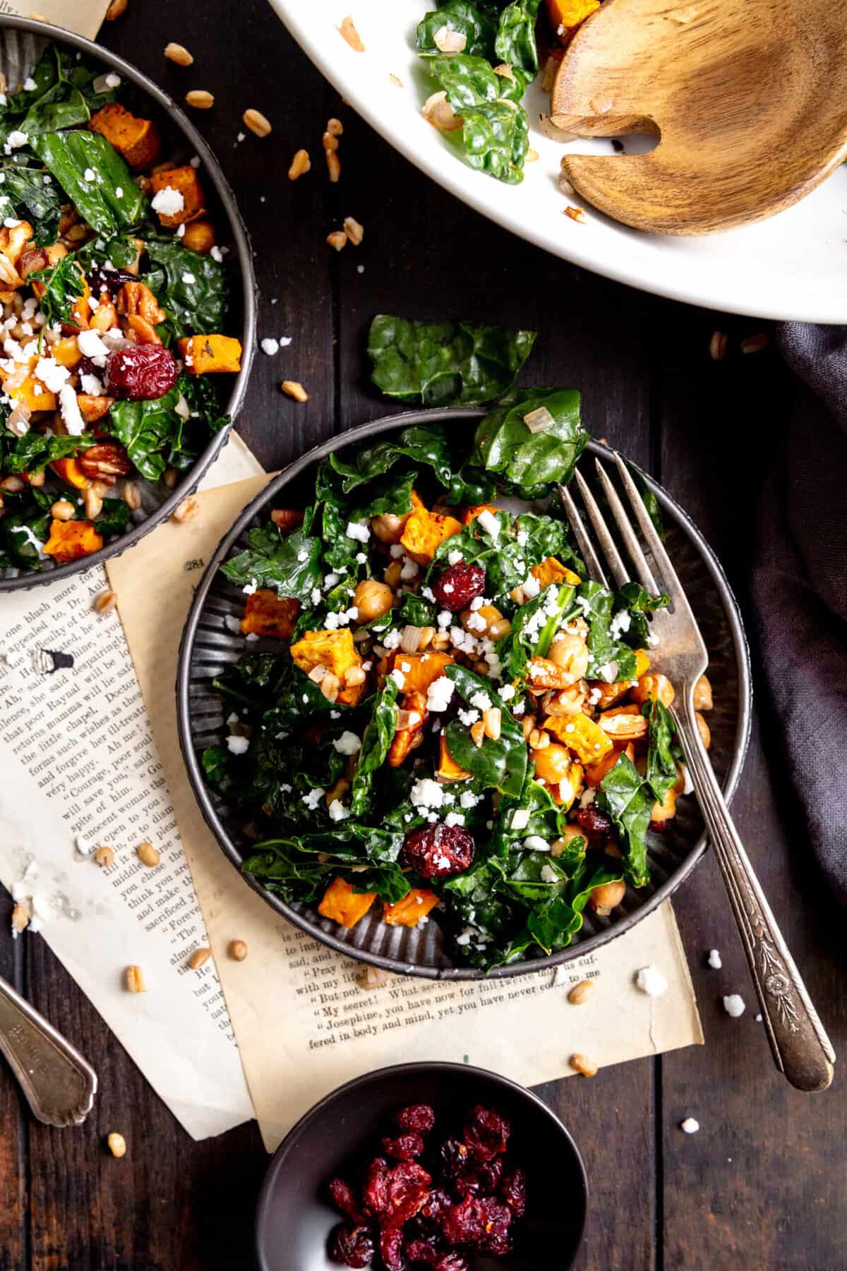 Kale sweet potato salad on a plate with a fork.