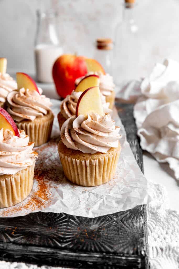 Apple cinnamon cupcake and a white linen napkin.