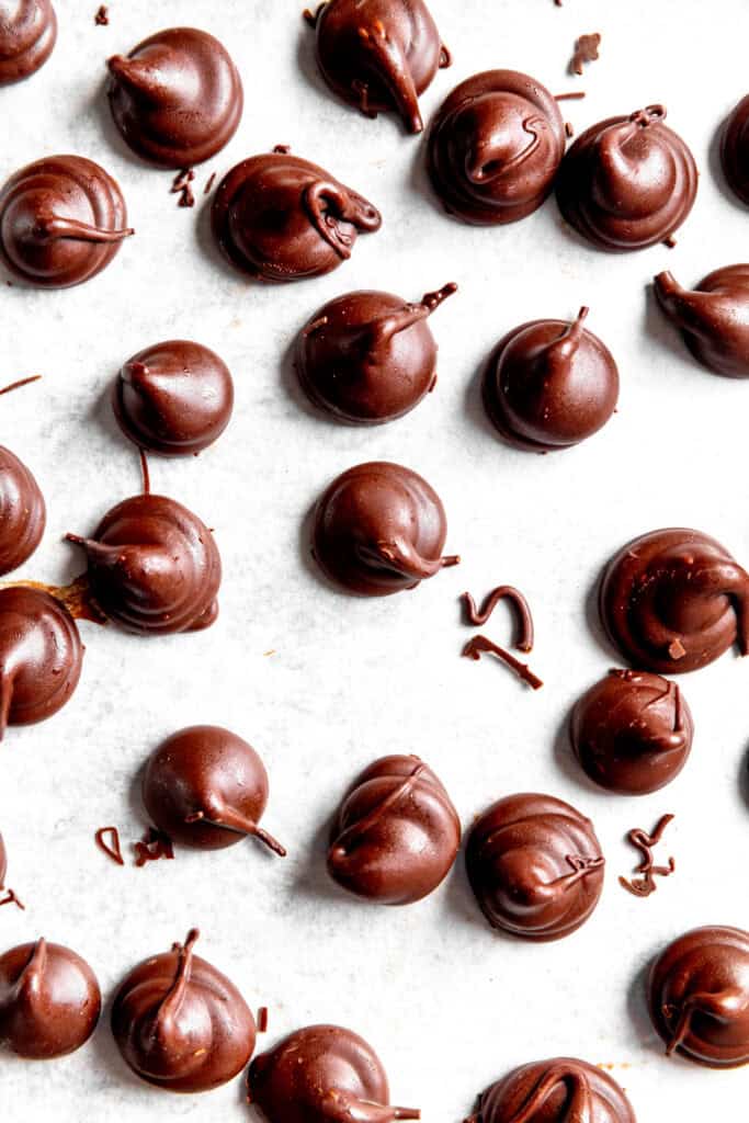 Vegan Hershey Kisses on a white background.