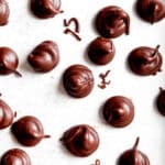 Vegan Hershey Kisses on a white background.