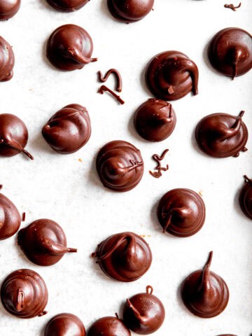 Vegan Hershey Kisses on a white background.