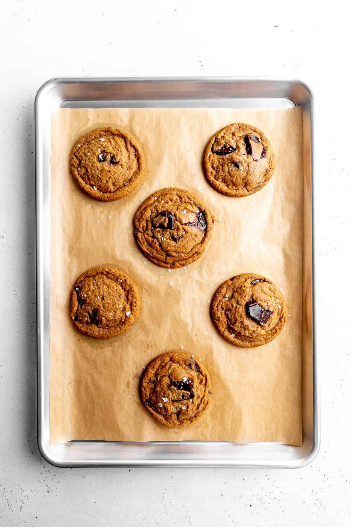 Espresso chocolate chip cookies on a baking sheet.