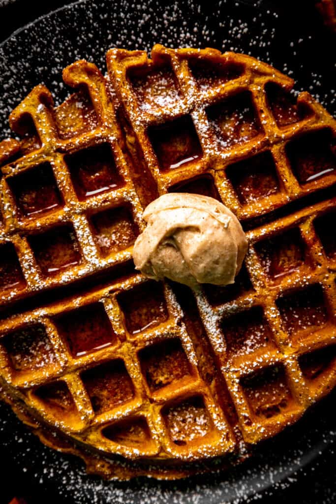Pumpkin waffle with a smear of cinnamon butter.