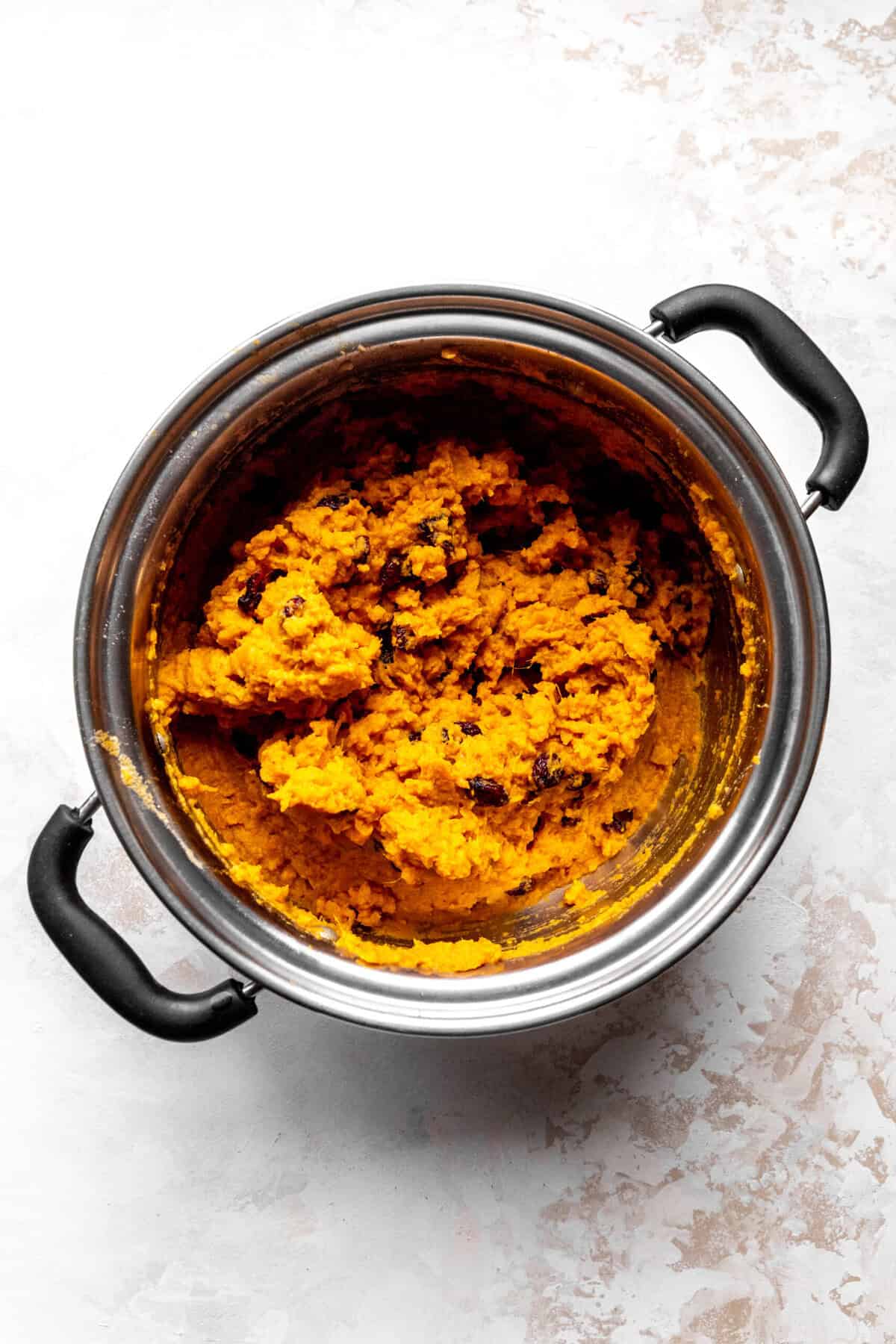 Pot of mashed sweet potatoes.