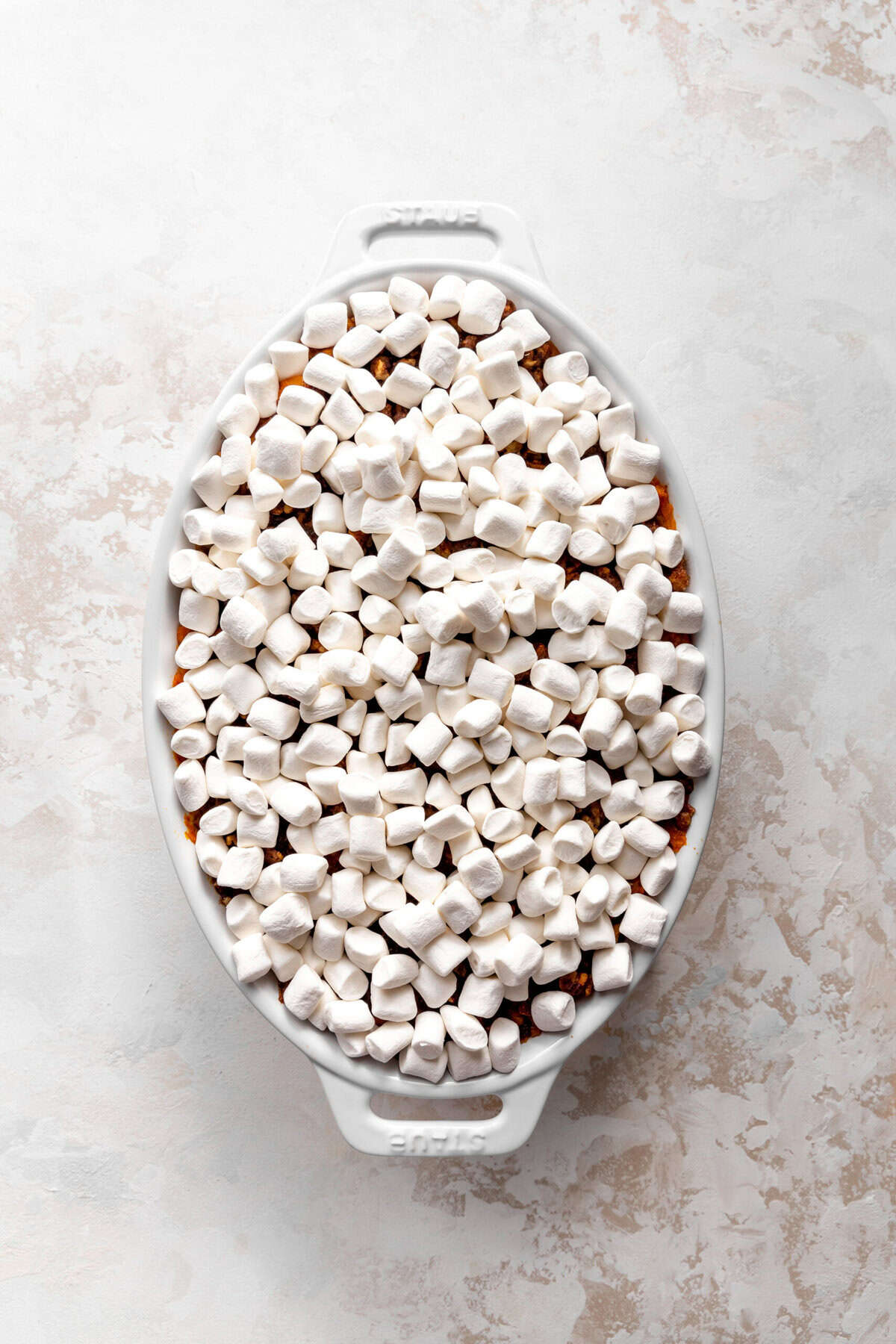 Sweet potato casserole topped with mini marshmallows.