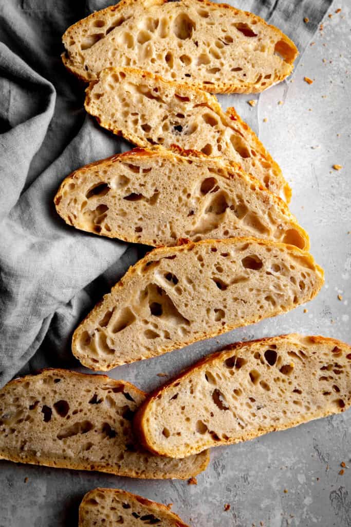 Slices of bread laid out on a linen napkin.
