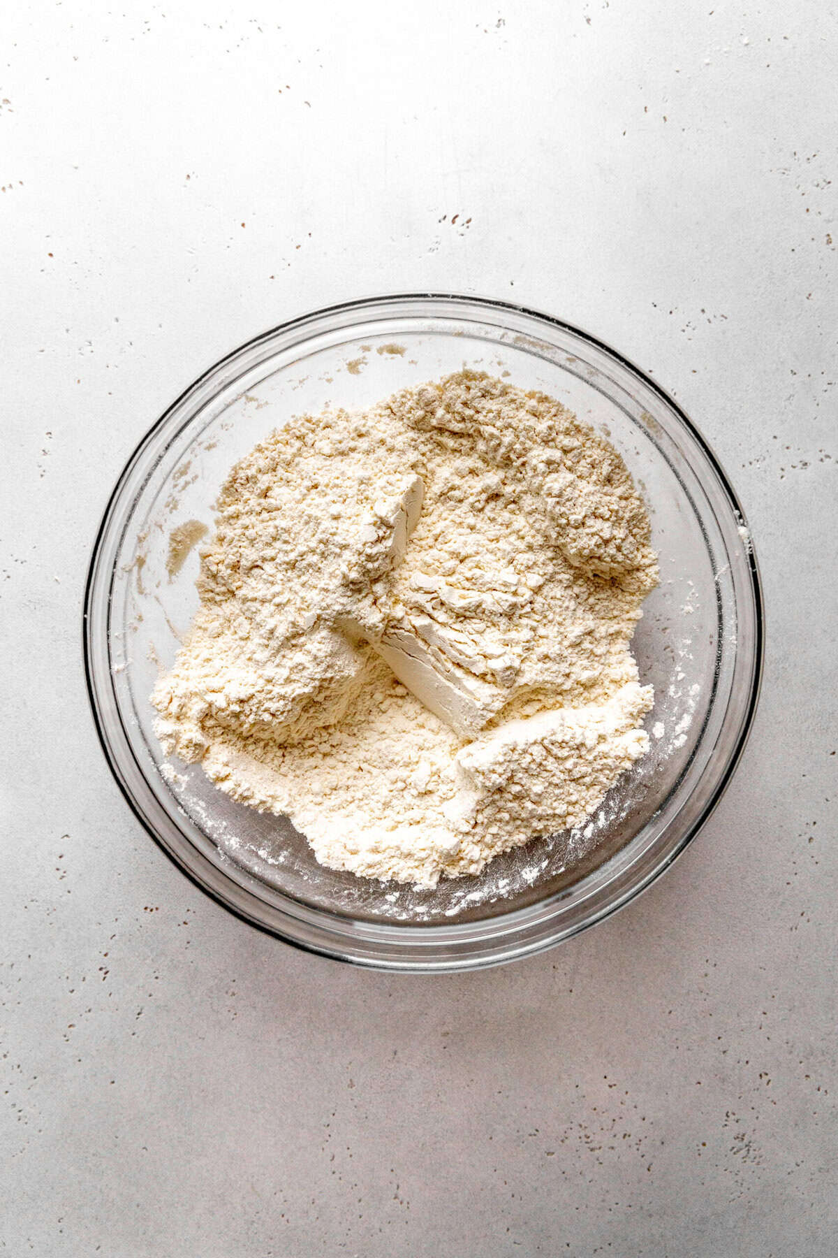 Glass bowl of flour.