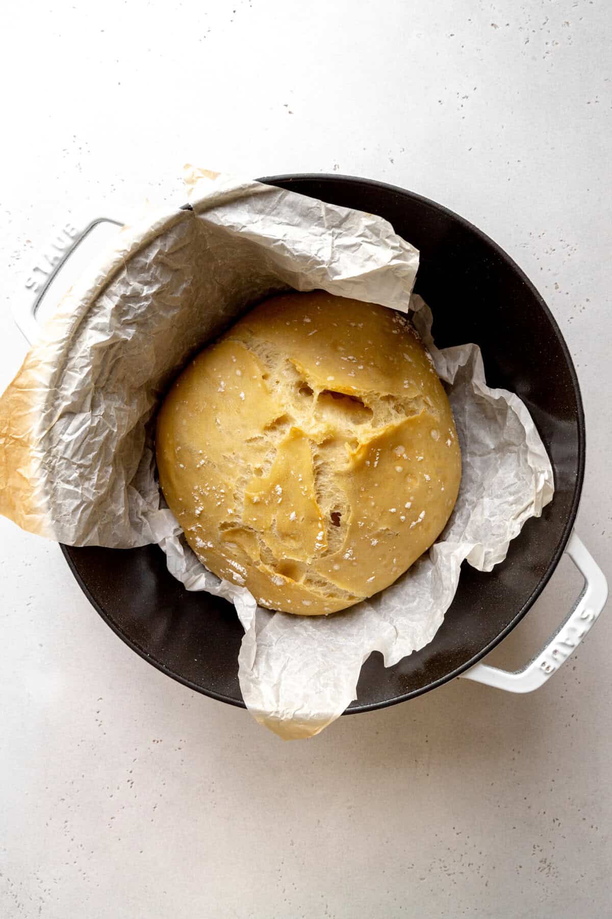Partially baked bread in a dutch oven.