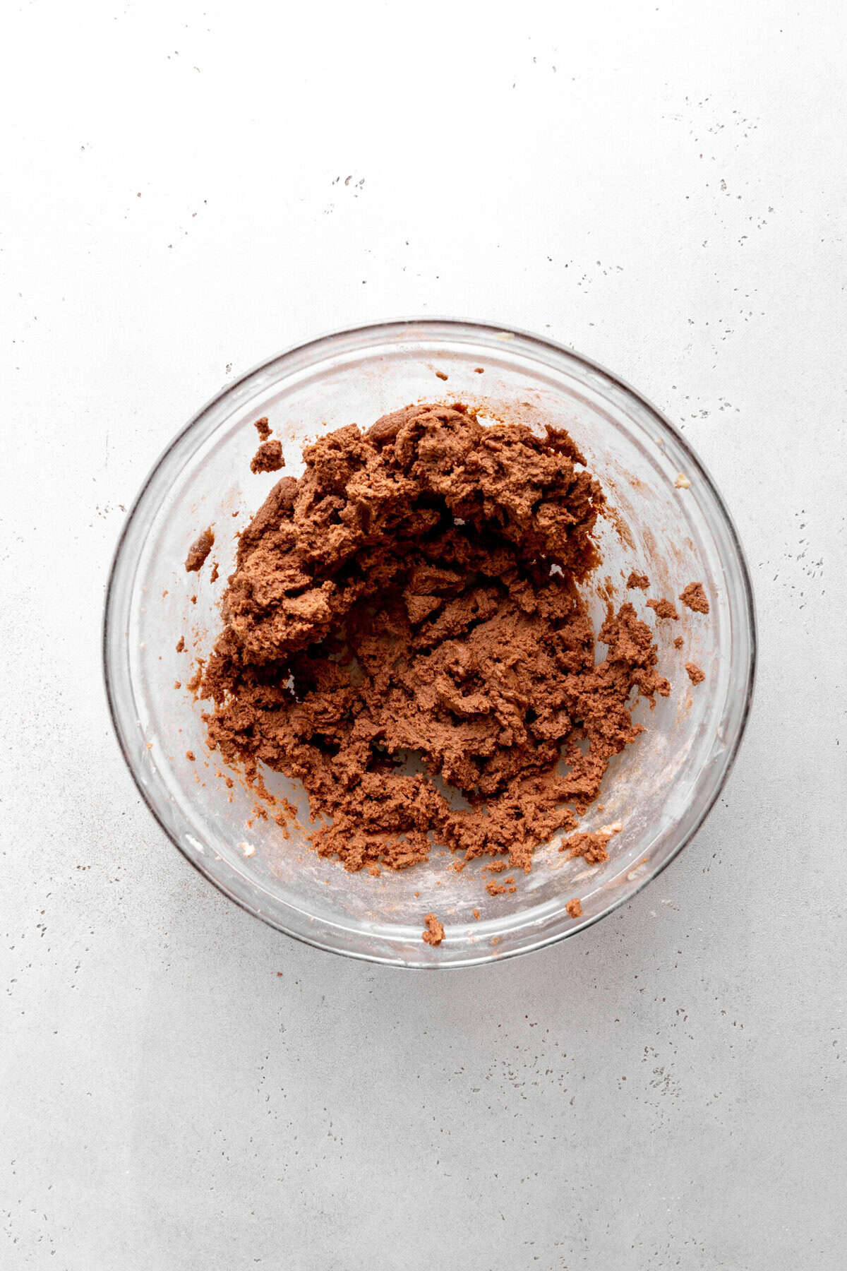 Glass bowl of chocolate cookie dough.