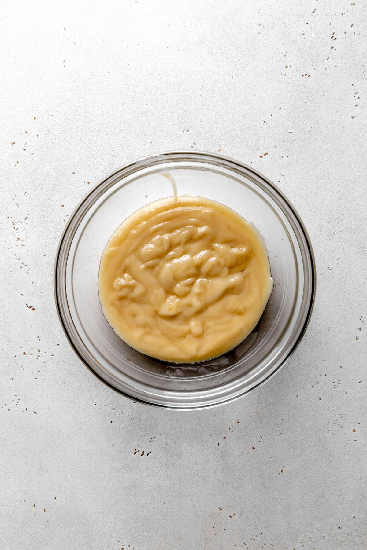 Glass bowl of coconut cream.