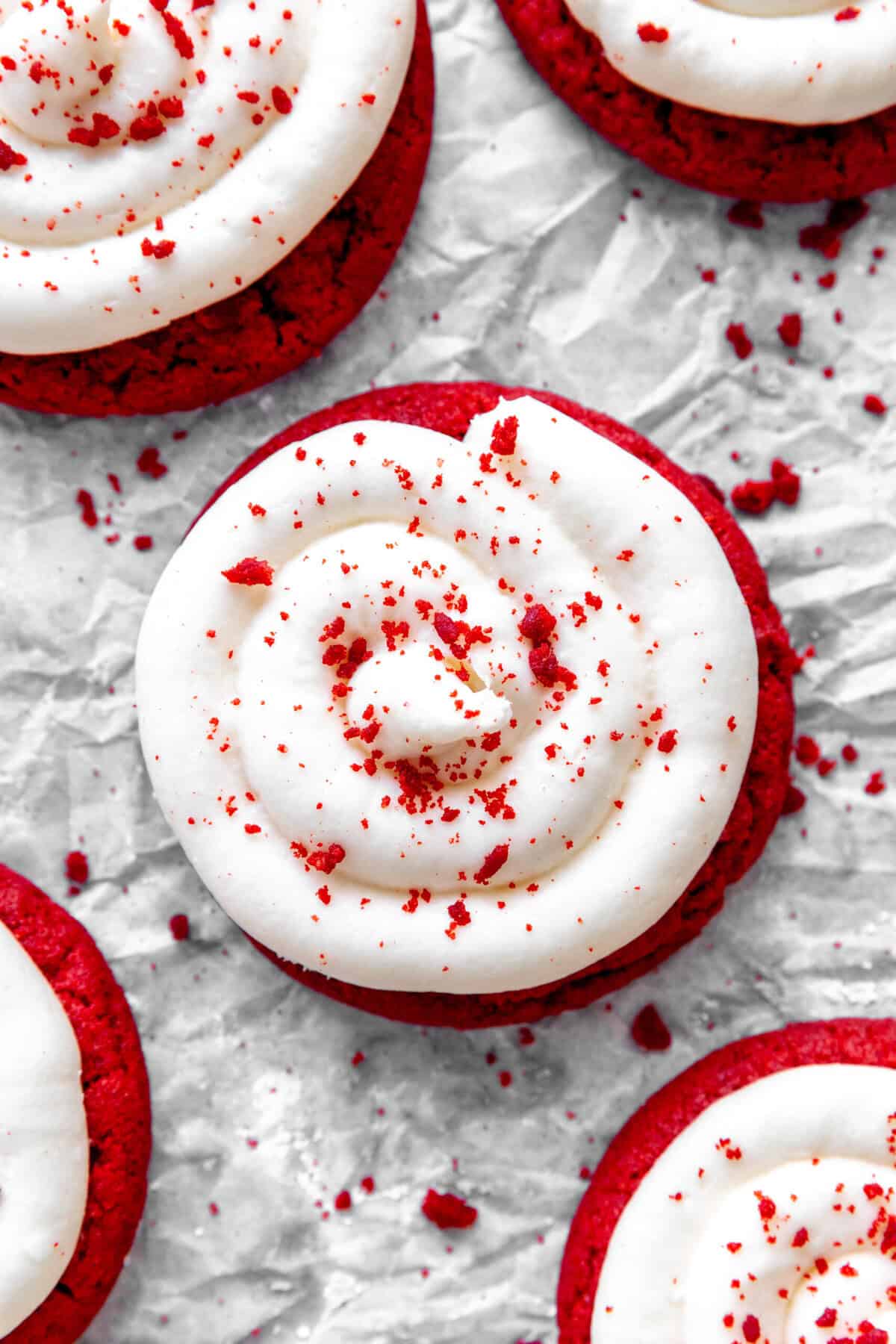 Red velvet cake cookie on white parchment paper.
