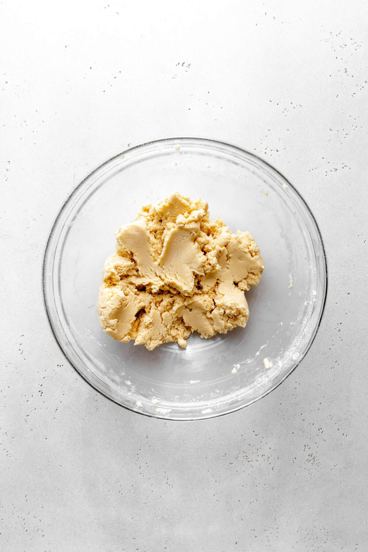 Glass bowl of sugar cookie dough.