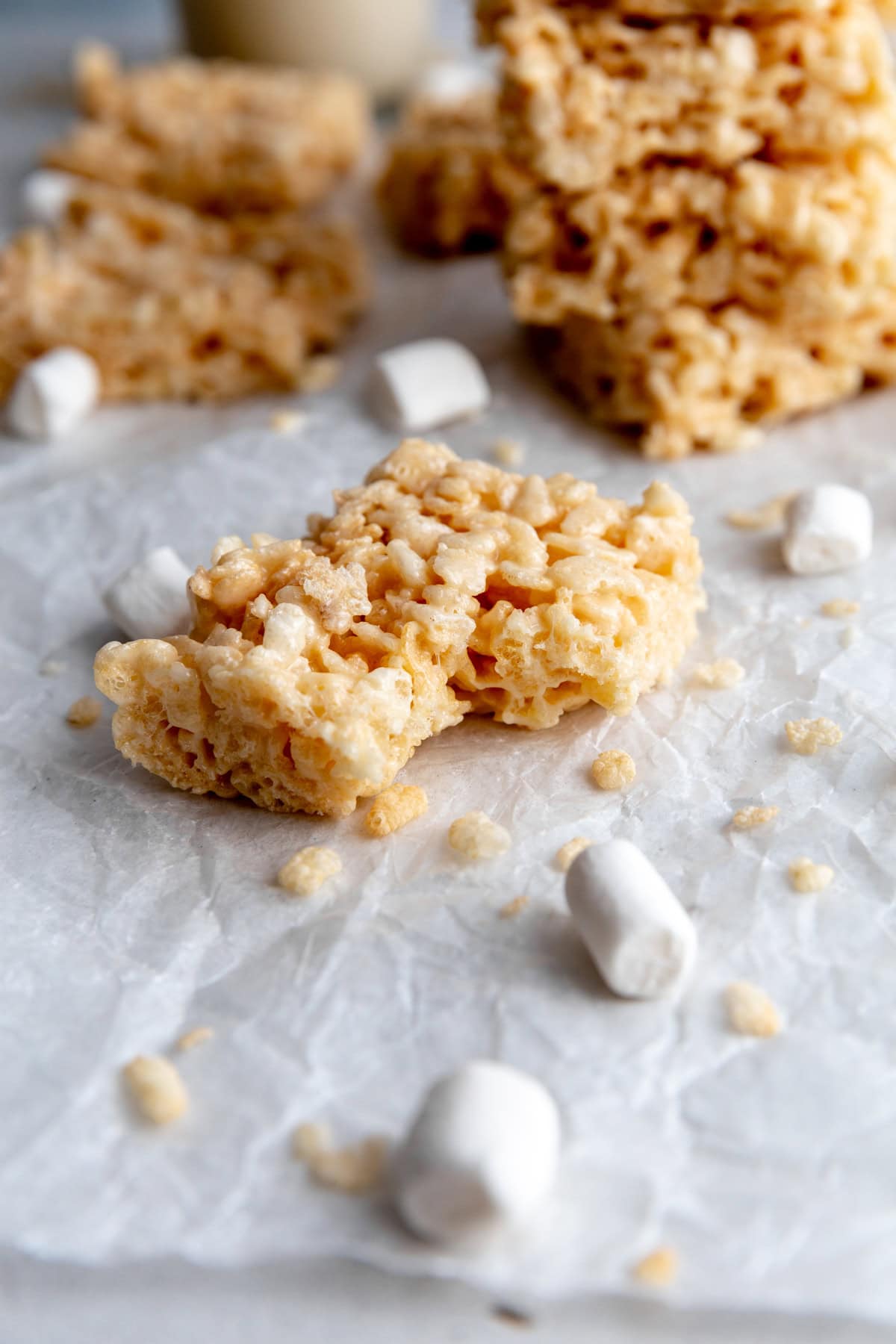 Rice krispie treat with a bite taken out of it.