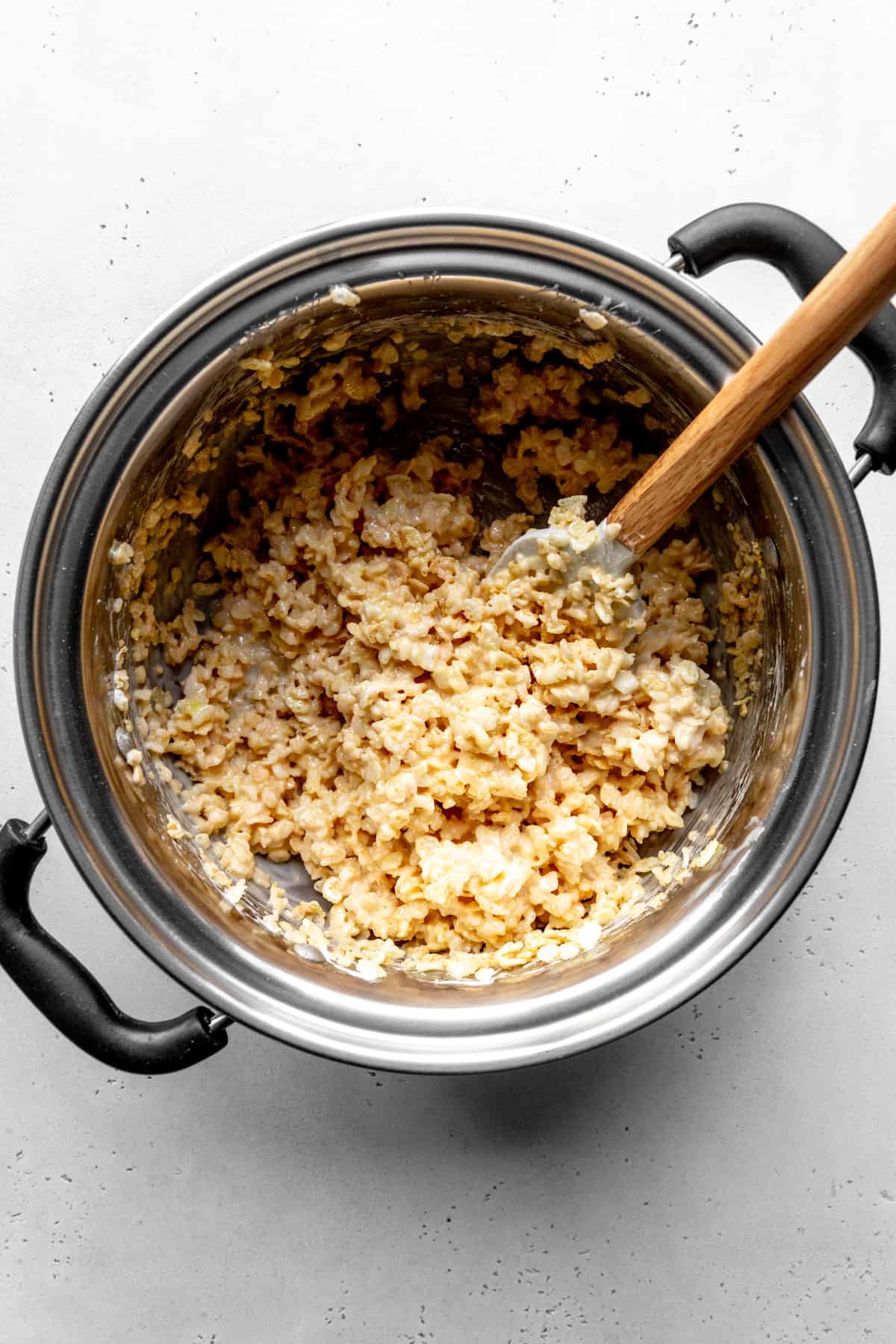 Put of crispy rice and melted marshmallows stirred together.