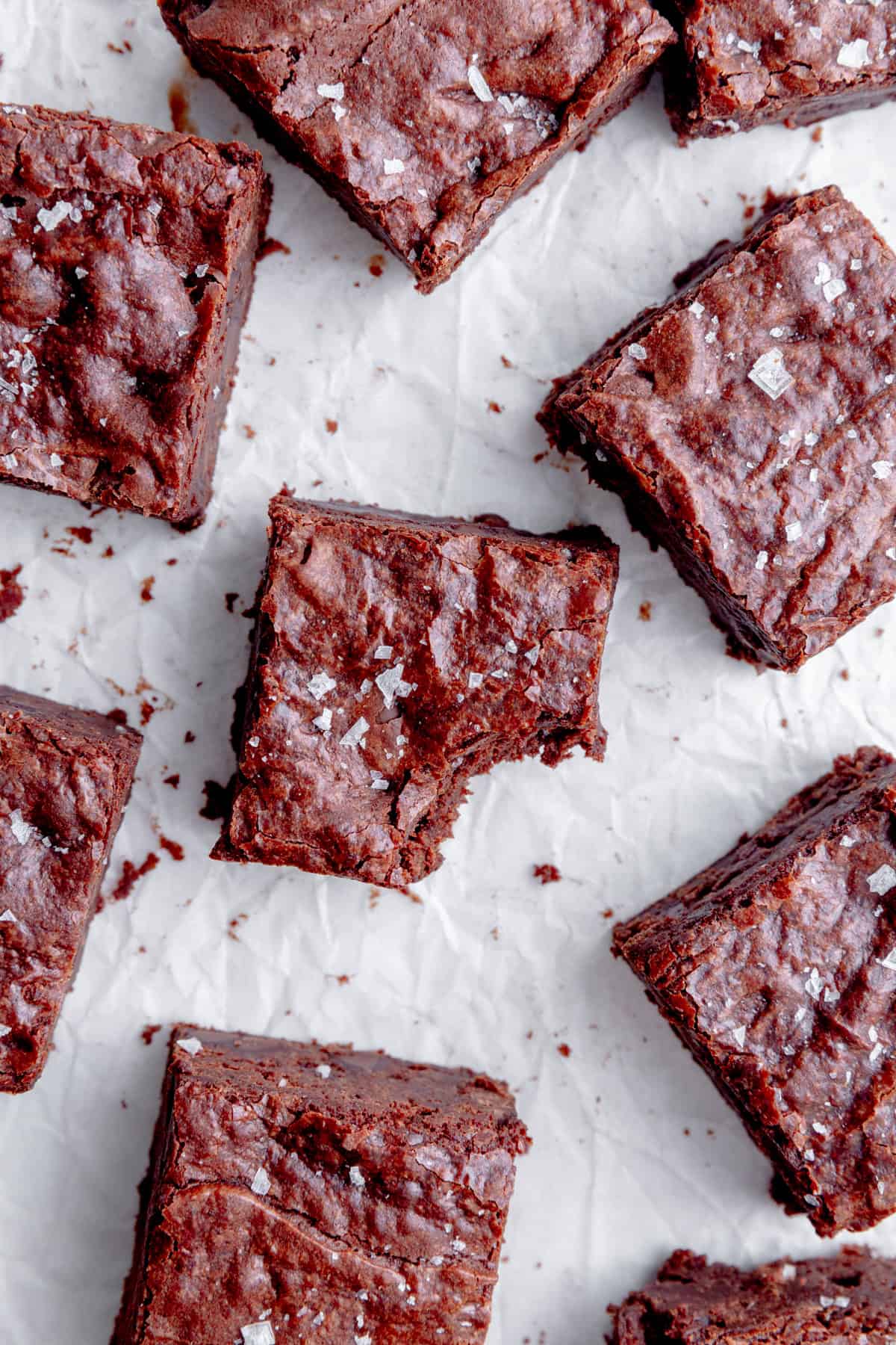 Vegan brownie with a bite taken out of it.