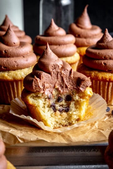 Vanilla cupcake stuffed with chocolate chip cookie dough topped with chocolate frosting.