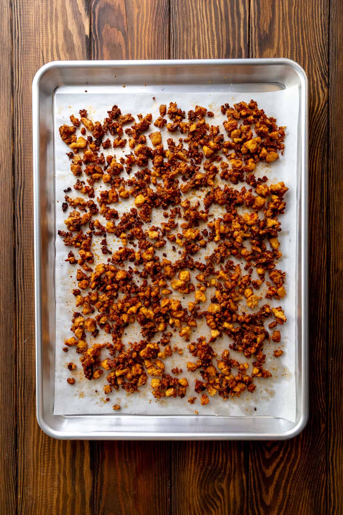 Crispy crumbled tofu on a baking sheet.