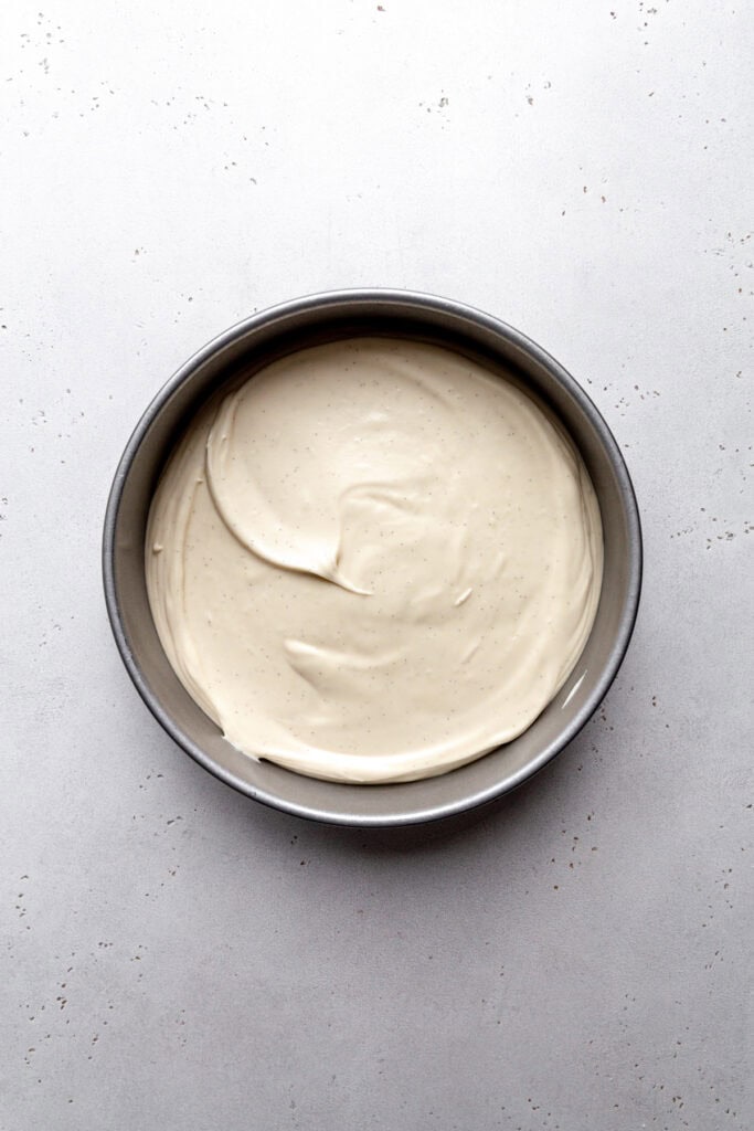 Vegan vanilla ice cream base in a round cake pan.