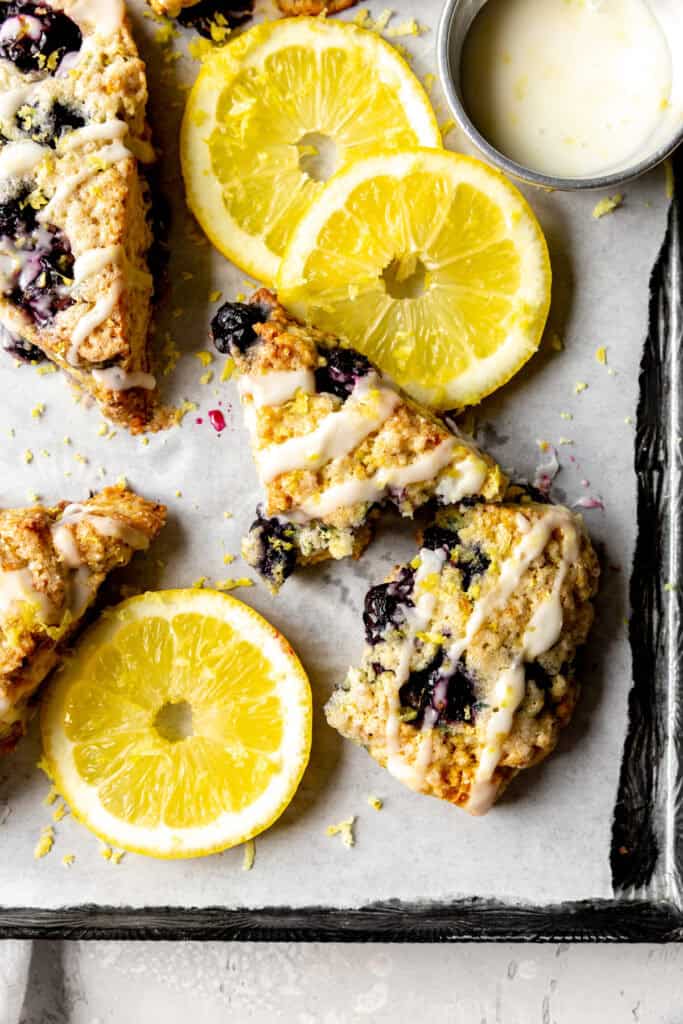 Lemon blueberry scone broken in half.