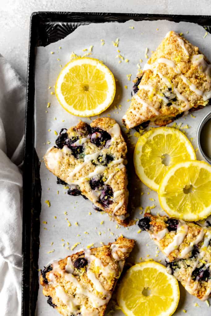 Lemon blueberry scones and a white linen napkin.