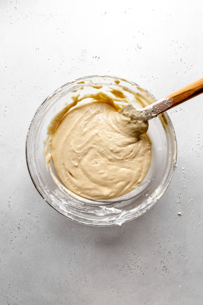 Glass bowl of lady finger batter.