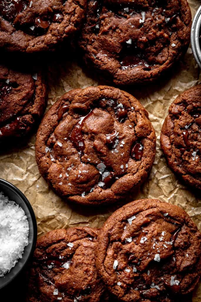 Double chocolate cookies on a baking sheet lined with parchment paper.